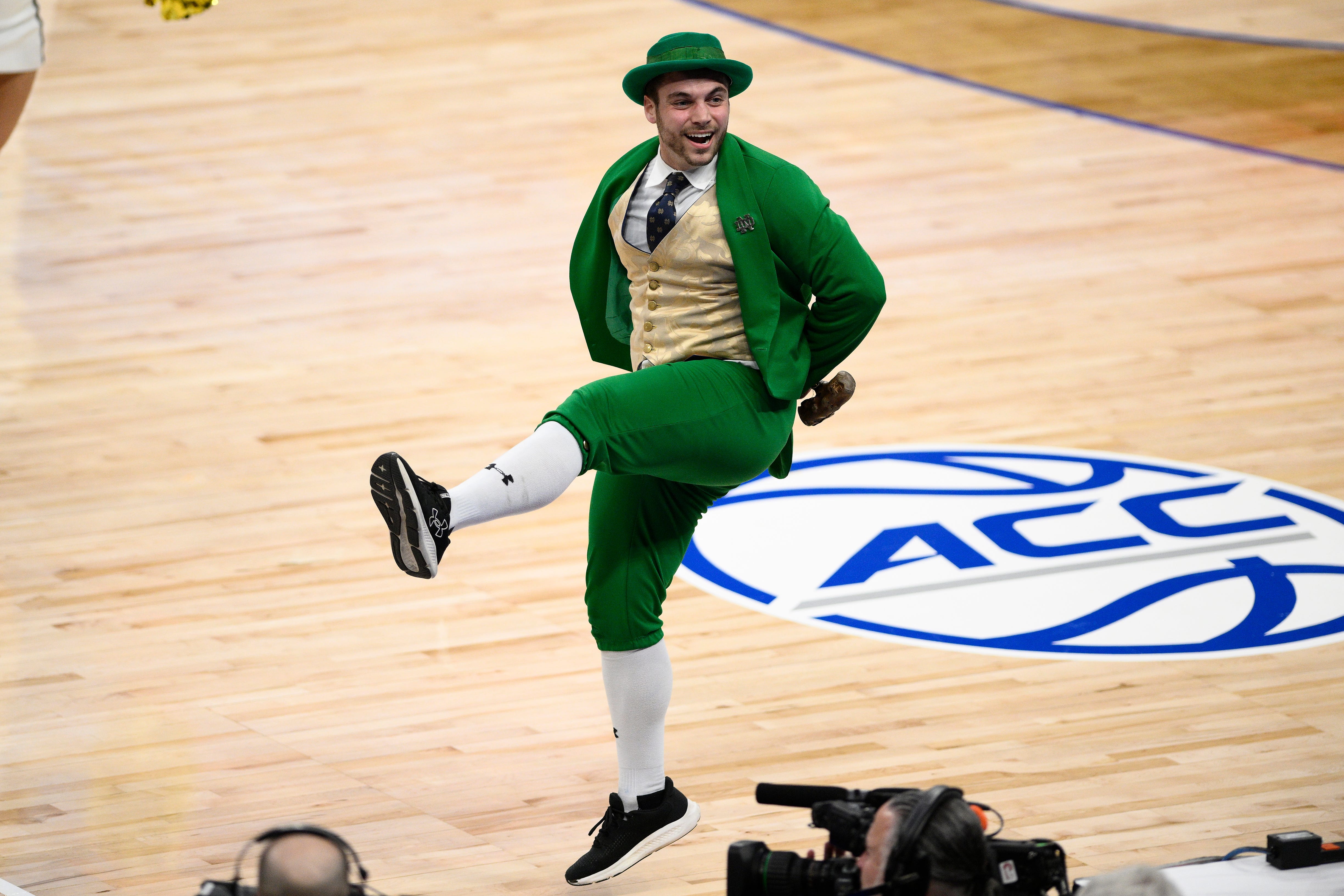 Notre Dame mascot performing during a game against Georgia Tech in the first half of the Atlantic Coast Conference NCAA college basketball tournament Tuesday, March 12, 2024, in Washington. (AP Photo/Nick Wass)
