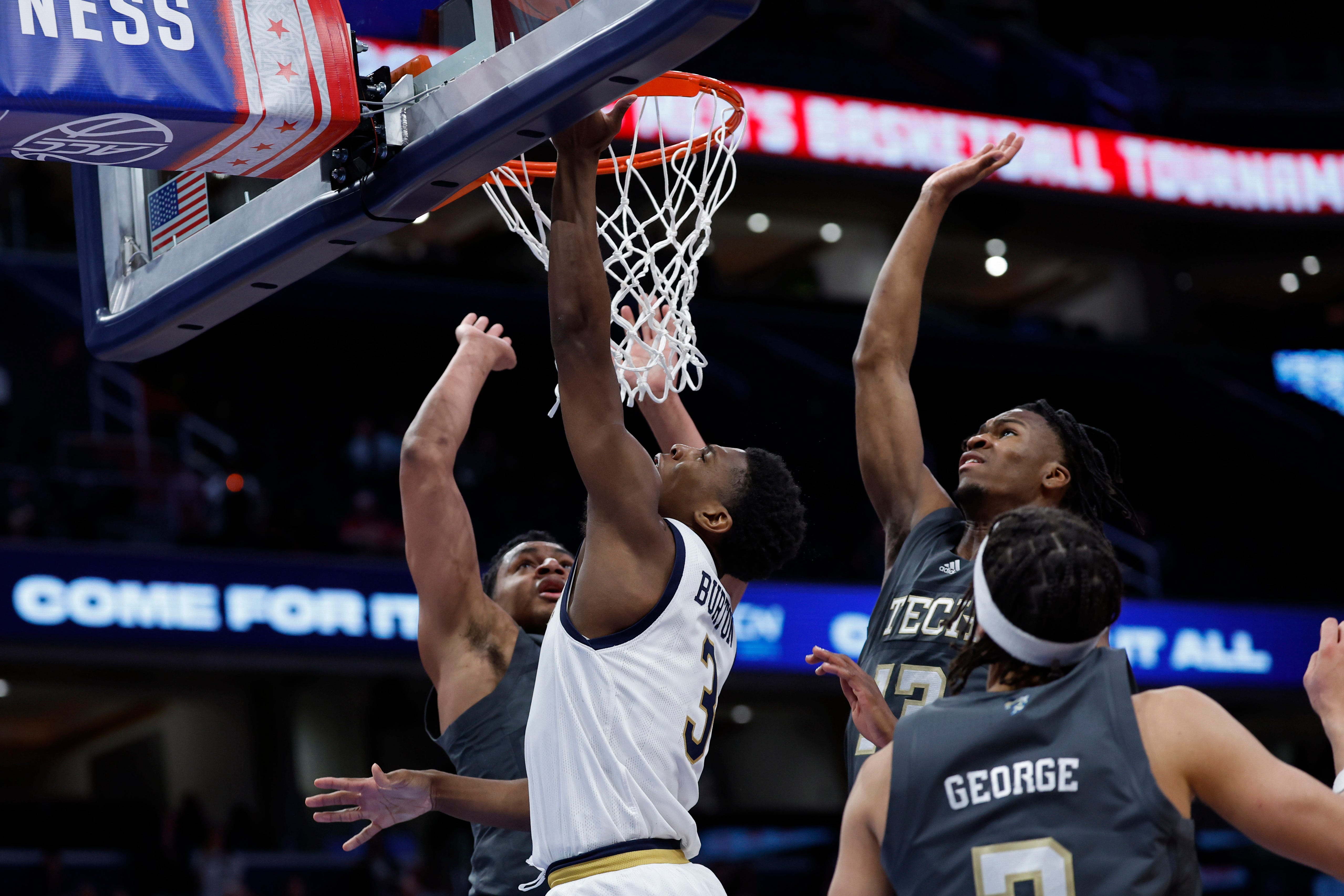 Mar 12, 2024; Washington, D.C., USA; Notre Dame Fighting Irish guard Markus Burton (3) shoots the ball as Georgia Tech Yellow Jackets guard Miles Kelly (13) defends in the second half at Capital One Arena. Mandatory Credit: Geoff Burke-USA TODAY Sports