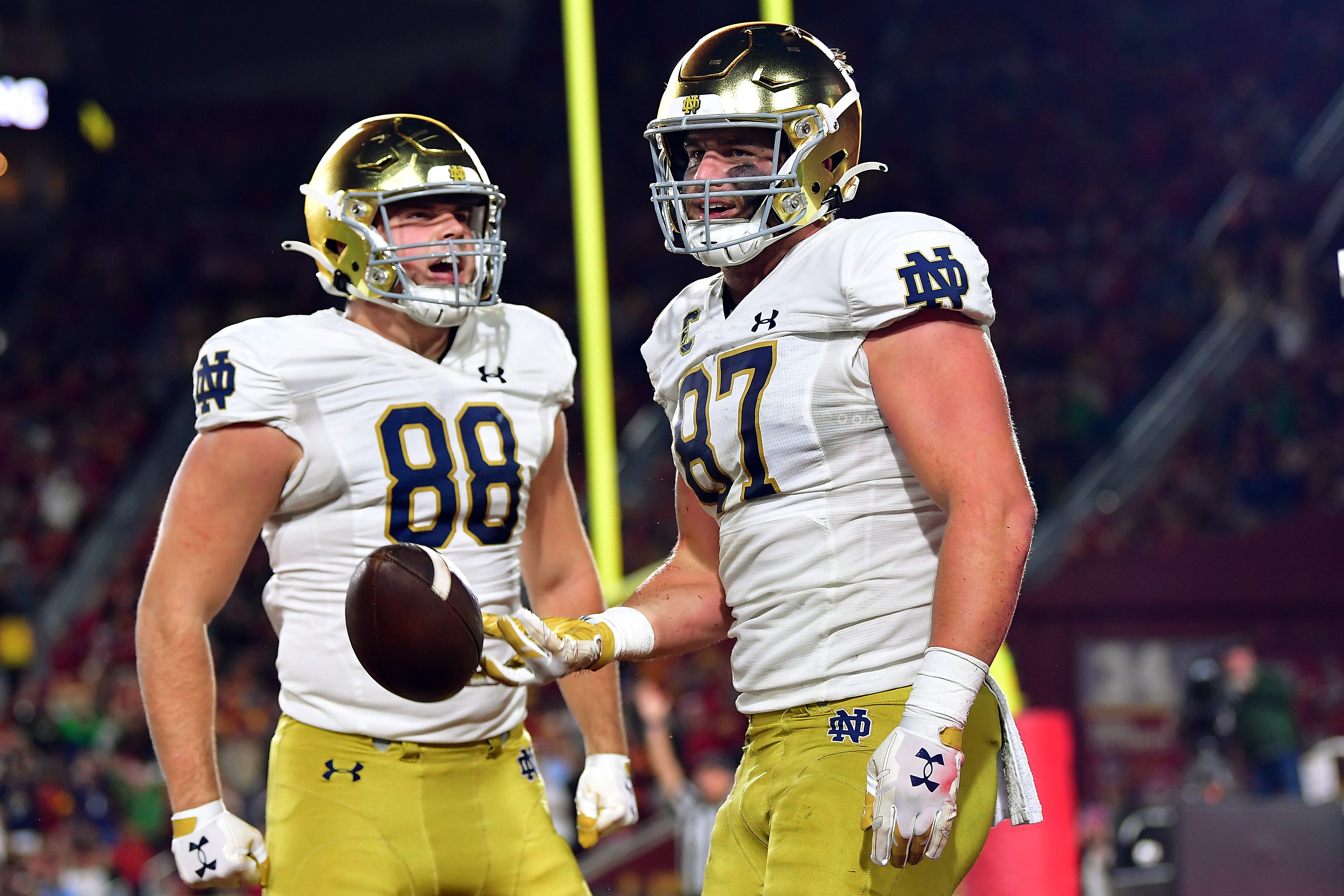 Nov 26, 2022; Los Angeles, California, USA; Notre Dame Fighting Irish tight end Michael Mayer (87) celebrates his touchdown scored against the Southern California Trojans with tight end Mitchell Evans (88) during the first half at the Los Angeles Memorial Coliseum. Mandatory Credit: Gary A. Vasquez-USA TODAY Sports