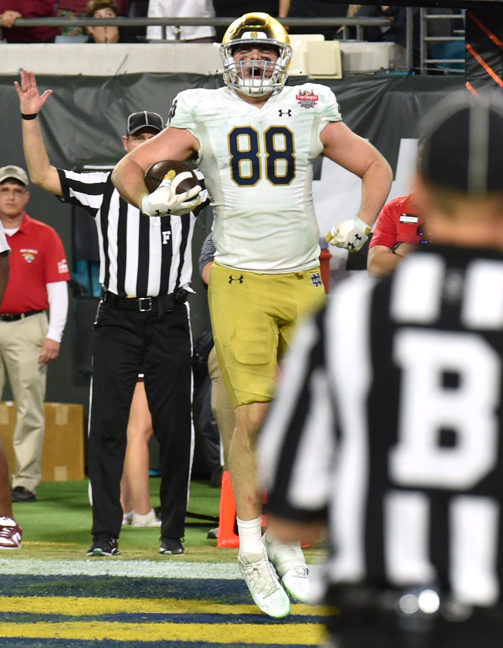 Notre Dame Fighting Irish tight end Mitchell Evans (88) celebrates after pulling in a pass that he took to the end zone for the game winning touchdown with just over a minute and a half to play in the game. The University of Notre Dame Fighting Irish took on the University of South Carolina Gamecocks in the TaxSlayer Gator Bowl game in Jacksonville, Florida's TIAA Bank Field Friday, December 30, 2022. The first half ended with South Carolina holding a 24 to 17 lead but Notre Dame came back and with a late fourth quarter touchdown, won the game 45 to 38. [Bob Self/Florida Times-Union]

Jki 123022 Bs Gatorbowl 24