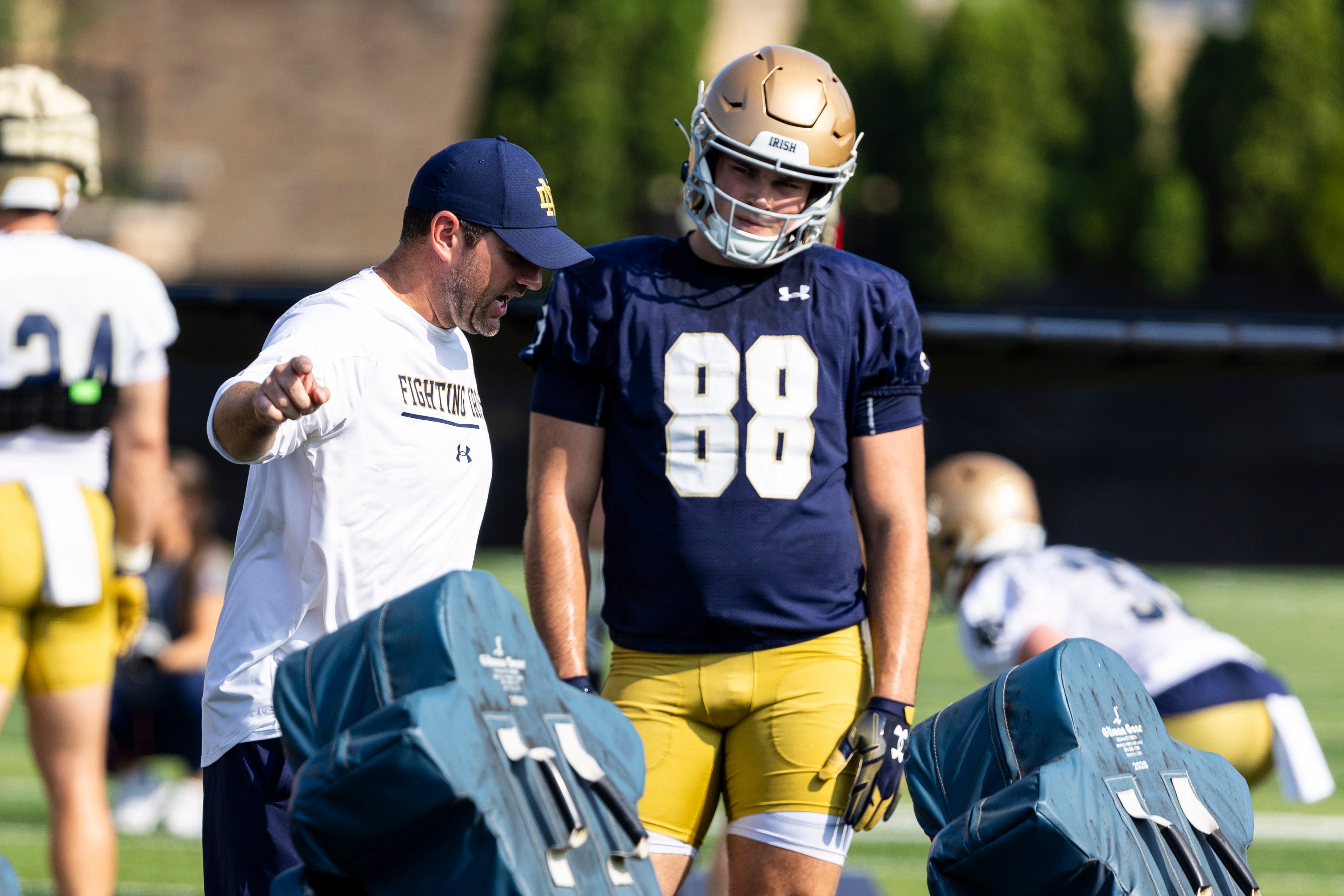 Notre Dame offensive coordinator Gerad Parker with a teaching moment with Mitchell Evans during Notre Dame Fall Camp on Wednesday, July 26, 2023, at Irish Athletics Center in South Bend, Indiana.