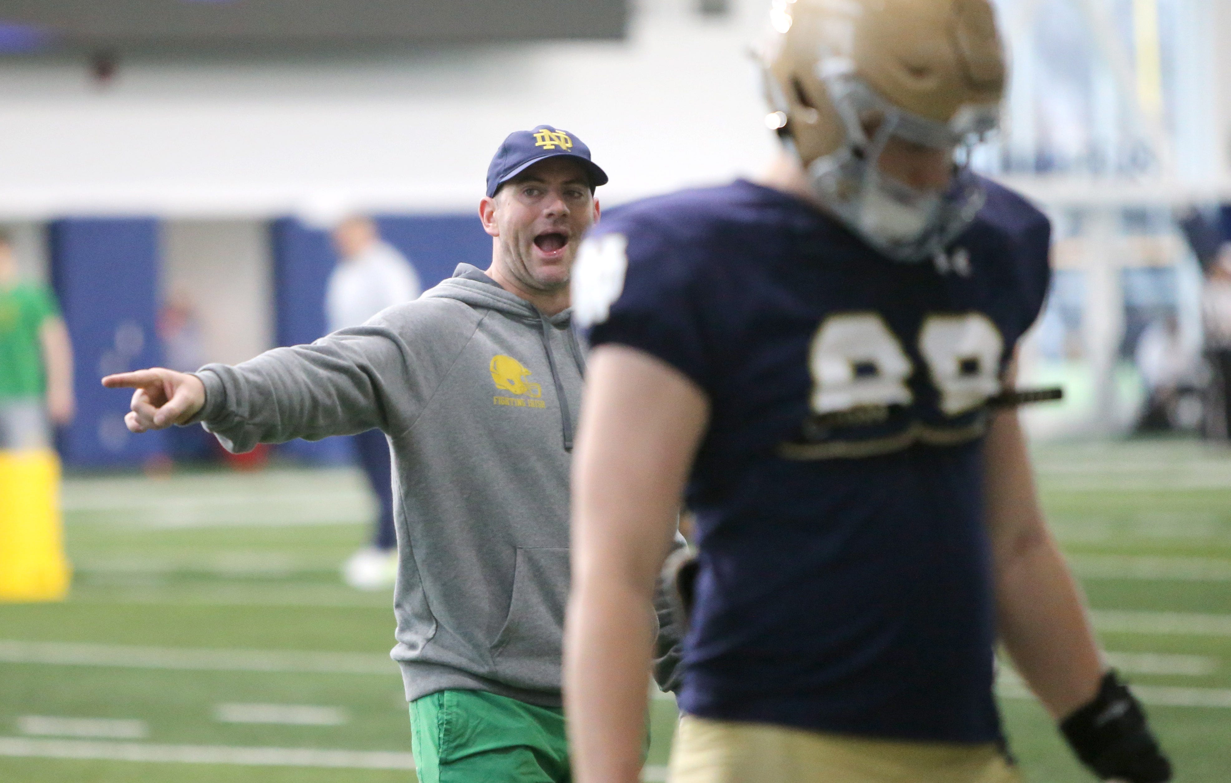 Notre Dame offensive coordinator/tight ends coach Gerad Parker calls out instructions as tight end Mitchell Evans (88) goes through drills Saturday, March 25, 2023, at Notre Dame spring football practice in South Bend.

Nd Fb Practice 03252023