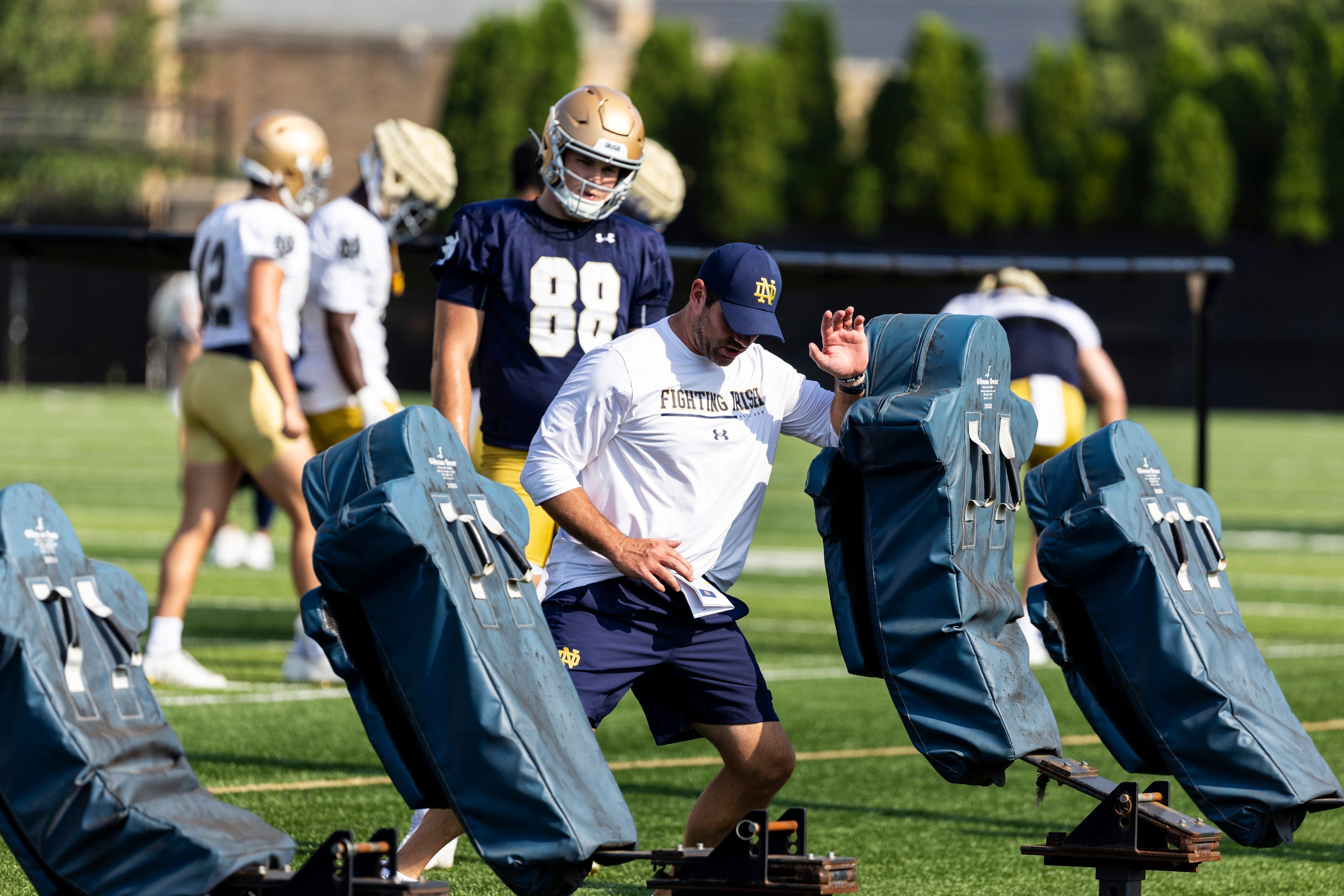 Notre Dame offensive coordinator Gerad Parker with a teaching moment with Mitchell Evans during Notre Dame Fall Camp on Wednesday, July 26, 2023, at Irish Athletics Center in South Bend, Indiana.