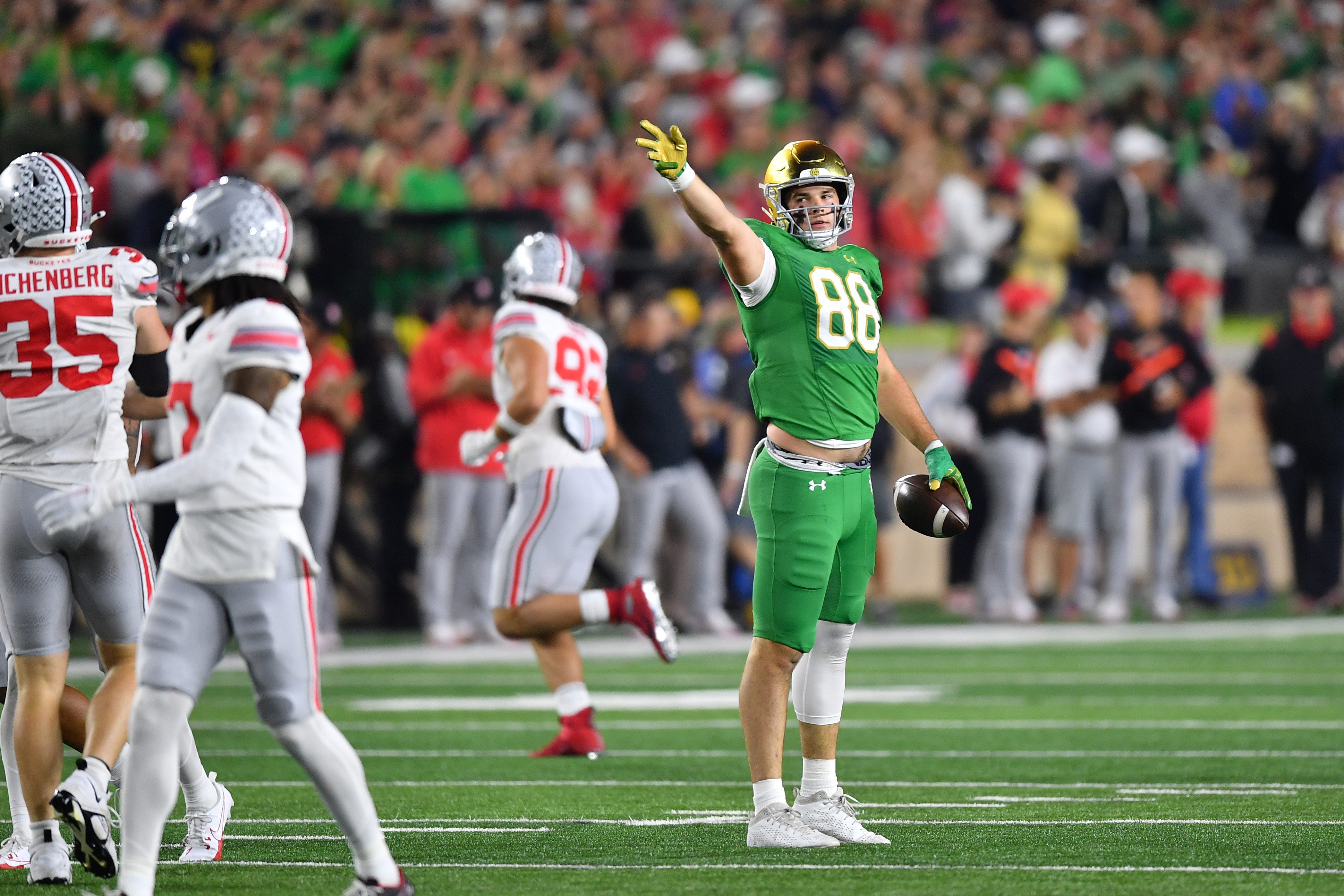 Sep 23, 2023; South Bend, Indiana, USA; Notre Dame Fighting Irish tight end Mitchell Evans (88) celebrates a catch for a first down in the fourth quarter against the Ohio State Buckeyes at Notre Dame Stadium. Mandatory Credit: Matt Cashore-USA TODAY Sports
