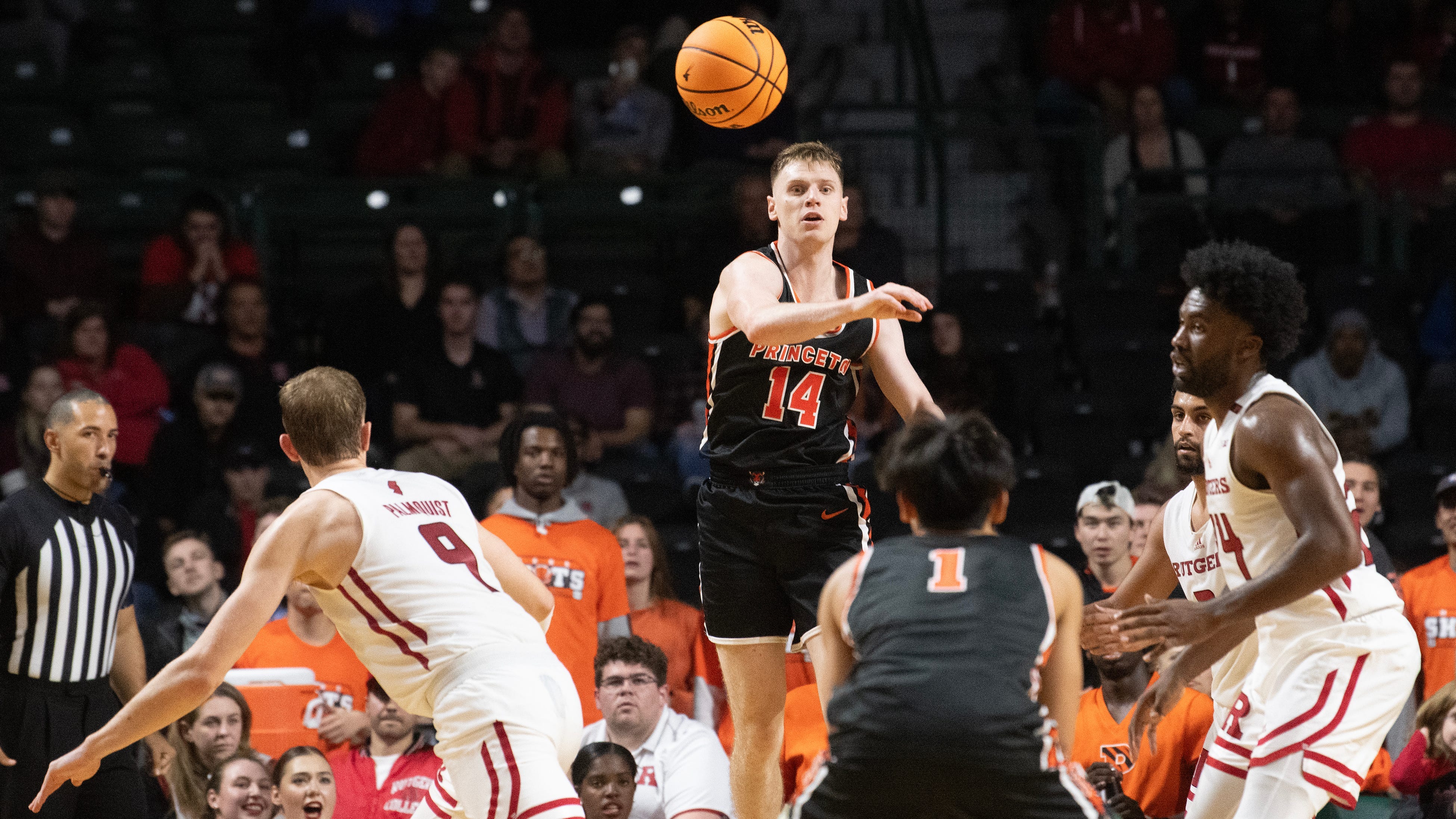 Princeton's Matt Allocco, top, throws a pass during the men's basketball game between Princeton and Rutgers played at the Cure Insurance Arena in Trenton on Monday, November 6, 2023.