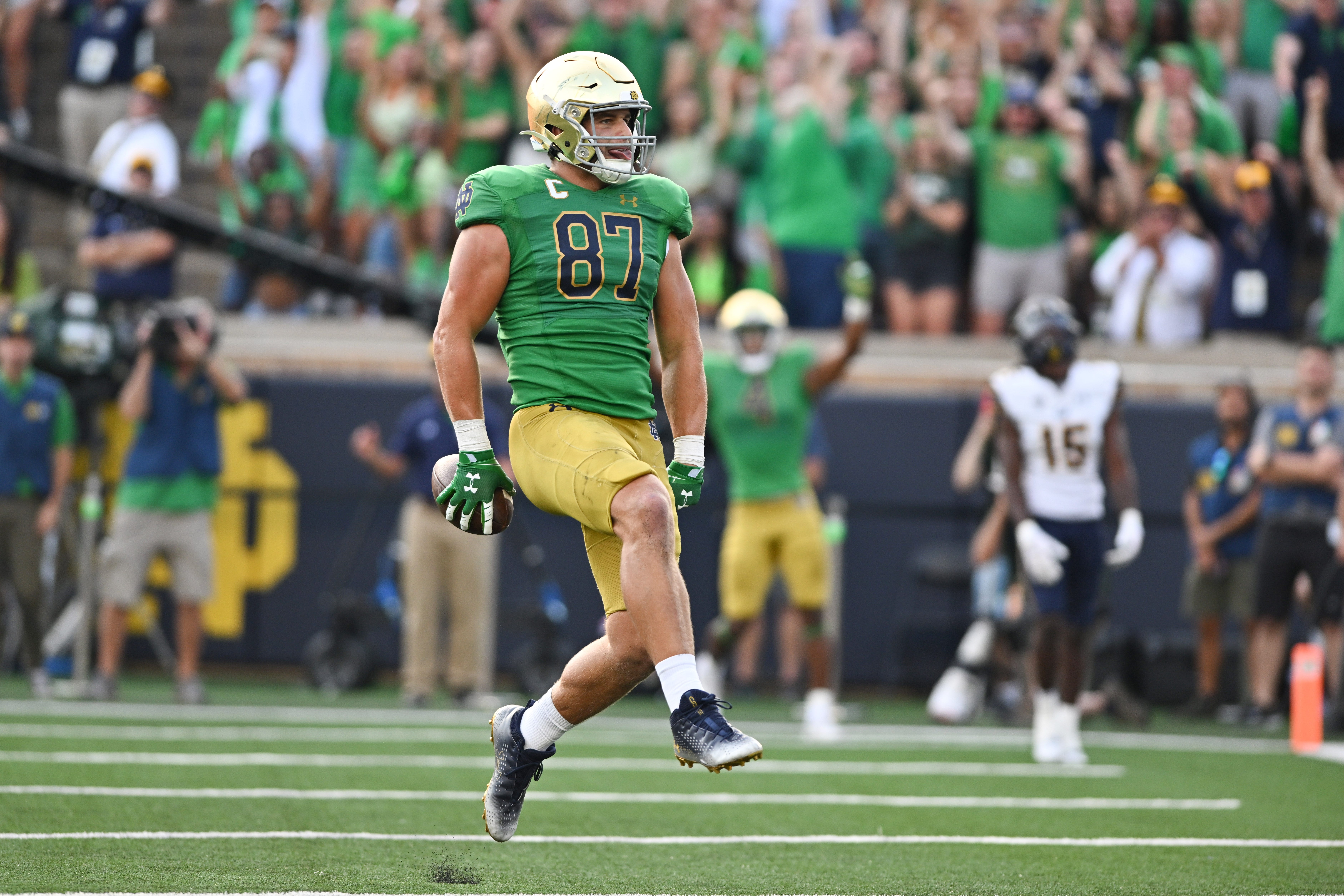 Sep 17, 2022; South Bend, Indiana, USA; Notre Dame Fighting Irish tight end Michael Mayer (87) celebrates after a touchdown in the fourth quarter against the California Bears at Notre Dame Stadium. Mandatory Credit: Matt Cashore-USA TODAY Sports