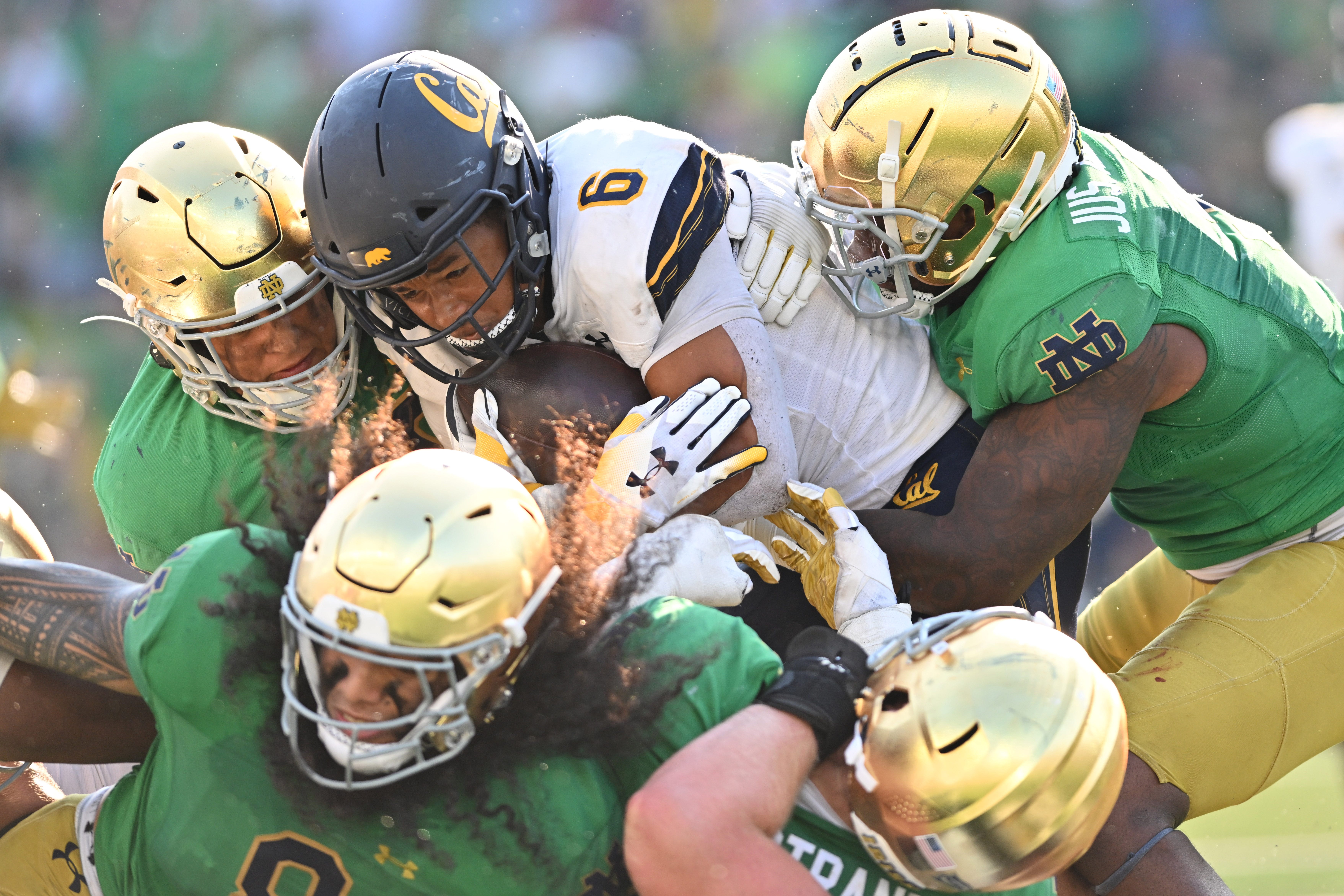 Sep 17, 2022; South Bend, Indiana, USA; California Bears running back Jadyn Ott (6) is tackled in the fourth quarter against the Notre Dame Fighting Irish at Notre Dame Stadium. Mandatory Credit: Matt Cashore-USA TODAY Sports